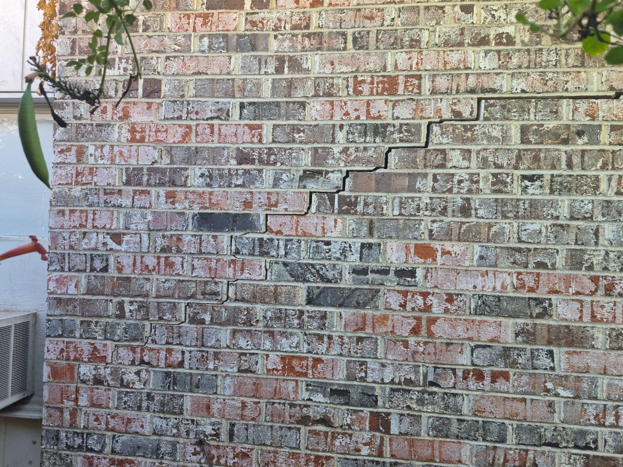 Stair-step crack in a brick exterior wall